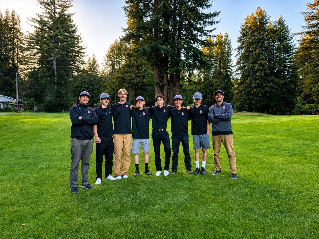 The SLV High School Boys Golf Team and coaches on the course